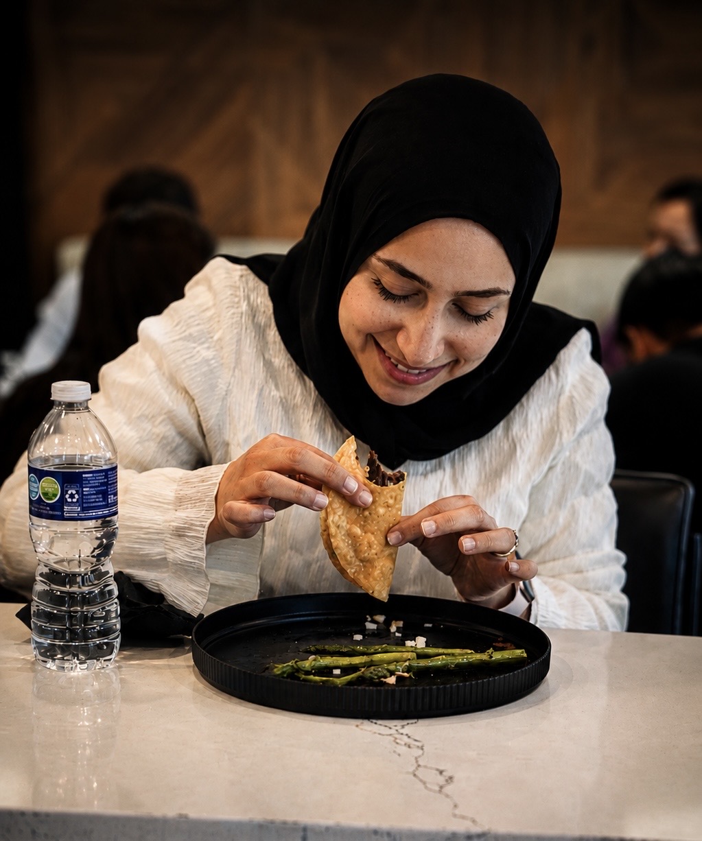 Guest enjoying a Wagyu steak taco at the Haus of Wagyu Experience